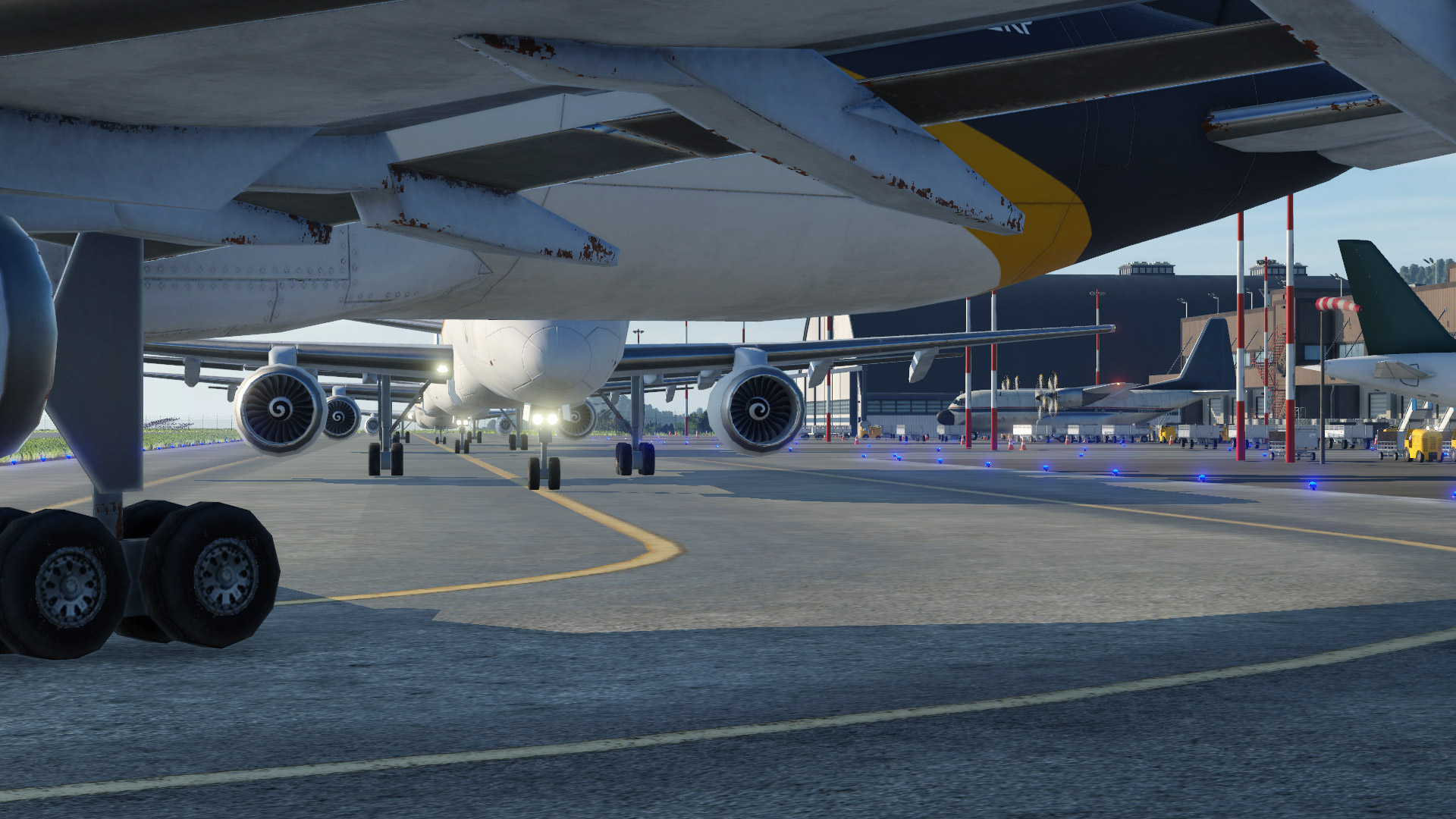 Transport Fever 2公式紹介画面：航空機を眺める視点も楽しむ